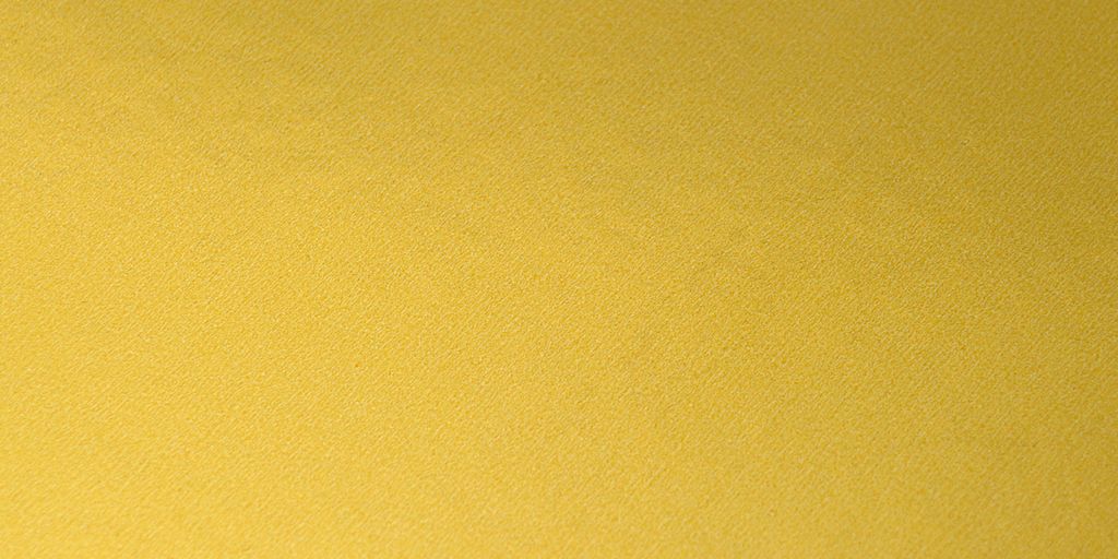 yellow textile in close up photography