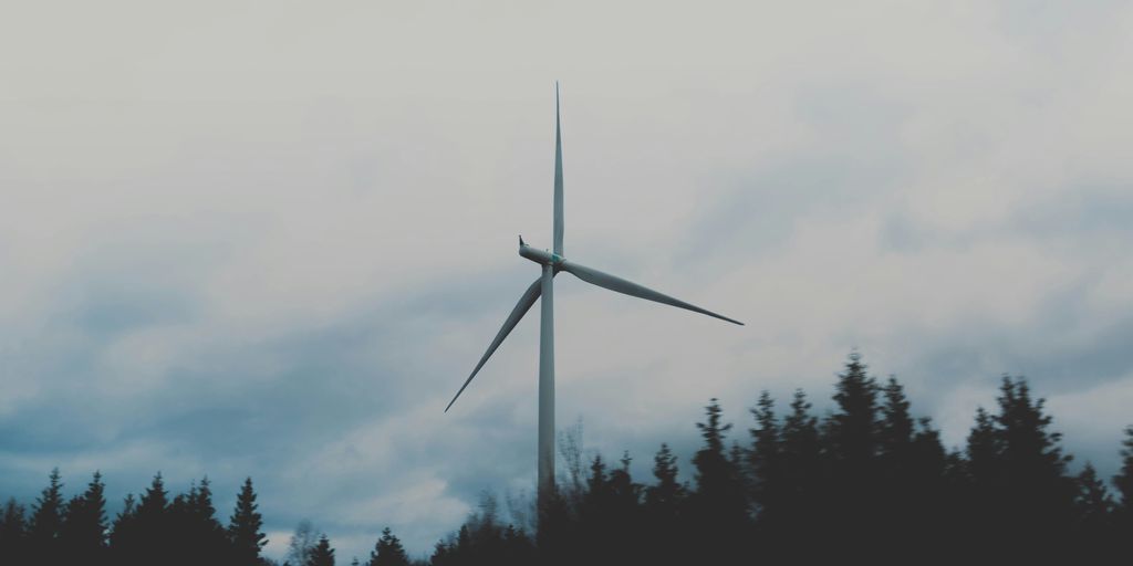 white windmill during cloudy sky