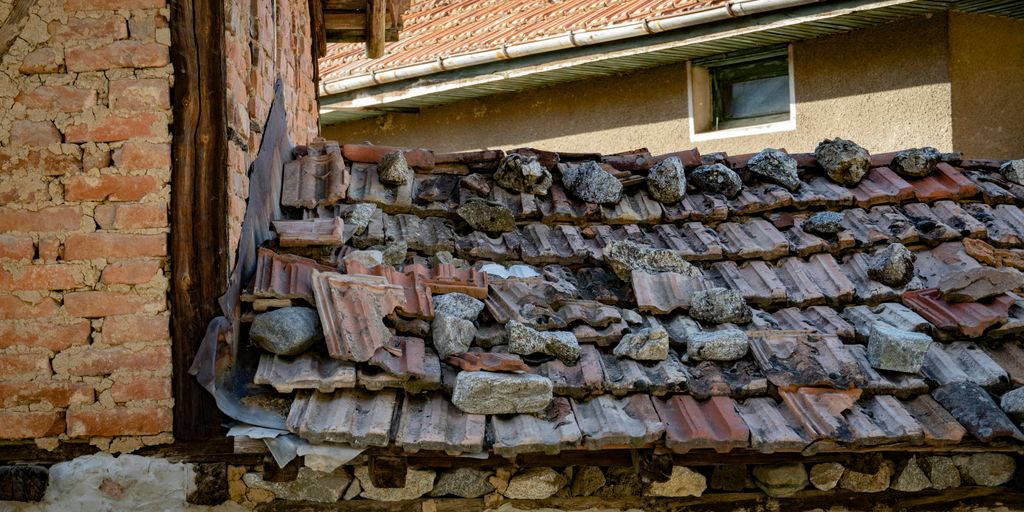 a pile of rocks outside a building