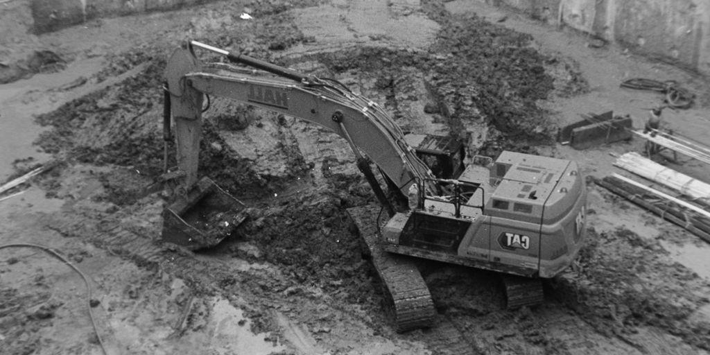 an old black and white photo of a construction site