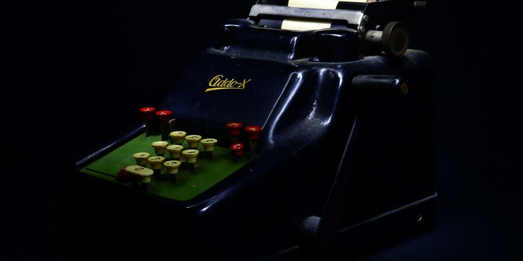 vintage black and green cash register